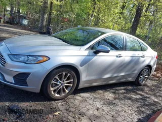 2019 Ford Fusion SE with VIN 3FA6P0HD0KR192915, listed as a IAAI auction lot 41980996 with 128,336 mi miles. Bid and sale history available at carsss.com. Image 14.