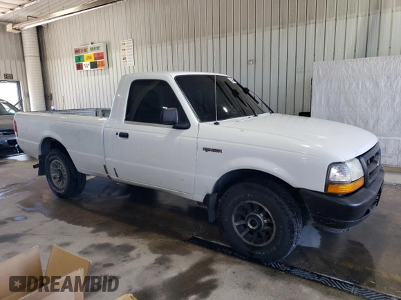 2000 Ford Ranger XL with VIN 1FTYR10V1YTA13232, listed as a Copart auction lot 54483055 with 217,473 mi miles and Salvage Title. Bid and sale history available at DreamBid. Image 4.