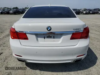 2012 BMW 7 Series 750i xDrive with VIN WBAKC6C56CDX99416, listed as a Copart auction lot 54857715 with 114,198 mi miles and Salvage Title. Bid and sale history available at carsss.com. Image 6.