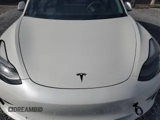 2023 Tesla Model 3 z VIN 5YJ3E1EA7PF573852, wystawiony jako Copart lot #57662565 z przebiegiem Nie podano mil oraz Szkoda całkowita • Salvage title. Historia ofert i sprzedaży dostępna na DreamBid. Obrazek 11.