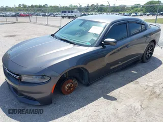 2015 Dodge Charger SE z VIN 2C3CDXBGXFH751491, wystawiony jako IAAI lot #41907243 z przebiegiem 112 545 mil mil oraz . Historia ofert i sprzedaży dostępna na DreamBid. Obrazek 17.