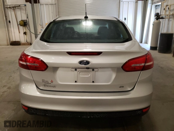 2017 Ford Focus SE with VIN 1FADP3F20HL319924, listed as a Copart auction lot 56351665 with 25,598 mi miles and Salvage title. Bid and sale history available at DreamBid. Image 6.