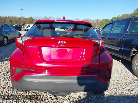 2020 Toyota C-HR LE with VIN JTNKHMBXXL1090061, listed as a IAAI auction lot 41124269 with 99,034 mi miles. Bid and sale history available at carsss.com. Image 17.