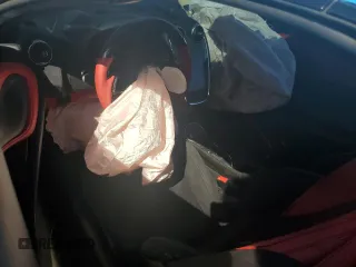 2019 McLaren 570S z VIN SBM13FAA9KW006456, wystawiony jako Copart lot #77400754 z przebiegiem Nie podano mil oraz Nie do naprawy. Historia ofert i sprzedaży dostępna na DreamBid. Obrazek 8.