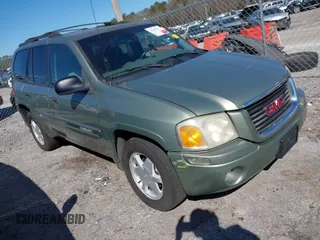 2003 GMC Envoy SLT with VIN 1GKDS13S432373988, listed as a IAAI auction lot 41840744 with 221,306 mi miles. Bid and sale history available at carsss.com. Image 1.