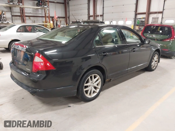 2011 Ford Fusion SEL with VIN 3FAHP0JGXBR212455, listed as a IAAI auction lot 41995300 with 222,018 mi miles. Bid and sale history available at carsss.com. Image 4.