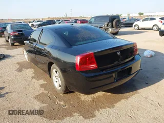 2007 Dodge Charger with VIN 2B3KA43R57H733823, listed as a IAAI auction lot 42041321 with 231,096 mi miles and . Bid and sale history available at carsss.com. Image 3.