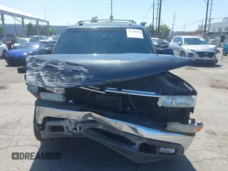 2005 Chevrolet Suburban LT z VIN 3GNGC26G85G249890, wystawiony jako IAAI lot #42348239 z przebiegiem 185 416 mil mil oraz . Historia ofert i sprzedaży dostępna na DreamBid. Obrazek 6.