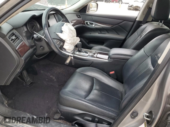 2013 Infiniti M37 with VIN JN1BY1AP0DM512605, listed as a Copart auction lot 48675735 with 129,598 mi miles and Salvage Title. Bid and sale history available at carsss.com. Image 7.
