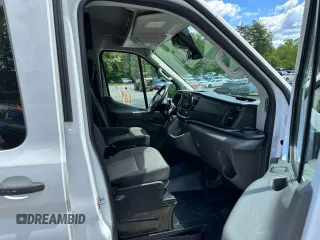 2020 Ford Transit Cargo z VIN 1FTBR1CG3LKB36452, wystawiony jako Copart lot #58659545 z przebiegiem 171 504 mil mil oraz Tytuł czysty. Historia ofert i sprzedaży dostępna na DreamBid. Obrazek 8.