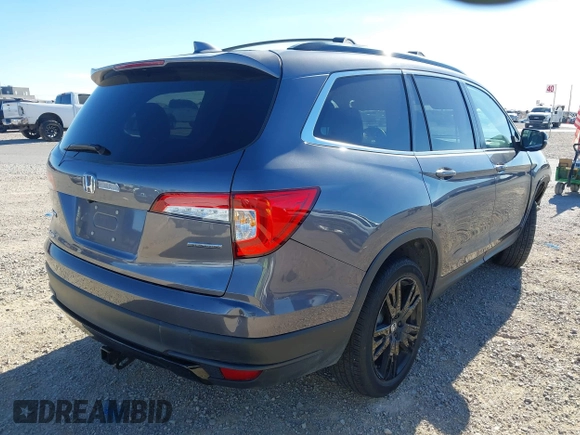 2022 Honda Pilot Special Edition with VIN 5FNYF5H27NB013972, listed as a IAAI auction lot 41219766 with 52,291 mi miles and . Bid and sale history available at carsss.com. Image 4.