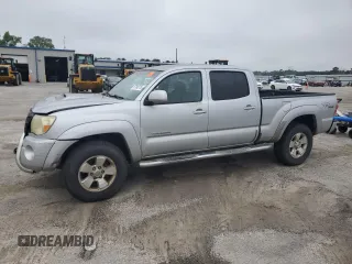 2006 Toyota Tacoma z VIN 3TMMU52N16M003104, wystawiony jako Copart lot #57995115 z przebiegiem 227 785 mil mil oraz Tytuł czysty. Historia ofert i sprzedaży dostępna na DreamBid. Obrazek 1.