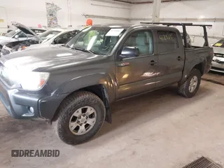 2014 Toyota Tacoma with VIN 3TMLU4EN3EM151917, listed as a IAAI auction lot 41769083 with 216,910 mi miles. Bid and sale history available at carsss.com. Image 2.