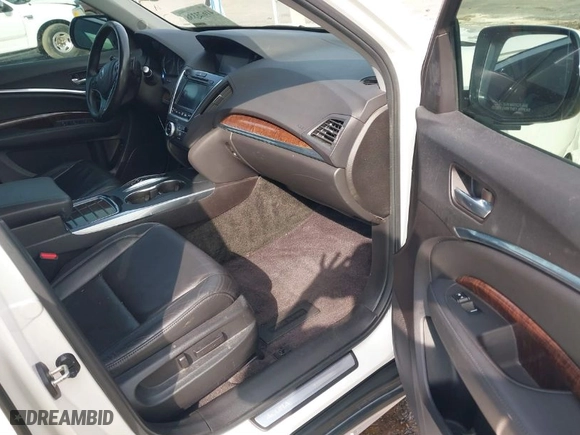 2017 Acura MDX w/Technology Pkg with VIN 5FRYD4H56HB041081, listed as a IAAI auction lot 41673338 with 115,198 mi miles. Bid and sale history available at carsss.com. Image 5.