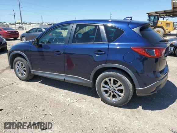 2014 Mazda CX-5 Touring with VIN JM3KE2CY7E0362879, listed as a Copart auction lot 53079545 with 70,863 mi miles and Salvage Title. Bid and sale history available at carsss.com. Image 2.