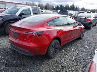 2024 Tesla Model 3 Long Range with VIN 5YJ3E1EB5RF733965, listed as a IAAI auction lot 41613919 with 11,570 mi miles and . Bid and sale history available at DreamBid. Image 4.