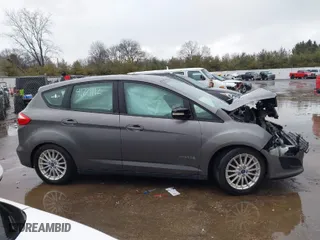 2013 Ford C-Max Hybrid SE with VIN 1FADP5AU2DL543064, listed as a IAAI auction lot 41721112 with 94,392 mi miles. Bid and sale history available at carsss.com. Image 14.