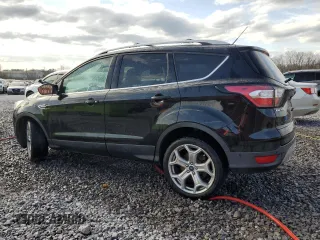2017 Ford Escape Titanium with VIN 1FMCU0J92HUB12281, listed as a Copart auction lot 49615875 with 126,590 mi miles and Salvage Title. Bid and sale history available at carsss.com. Image 2.
