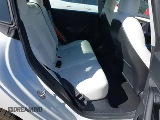 2022 Tesla Model 3 with VIN 5YJ3E1EA7NF103513, listed as a IAAI auction lot 41643592 with 35,631 mi miles and . Bid and sale history available at DreamBid. Image 8.