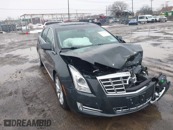 2013 Cadillac XTS Luxury z VIN 2G61R5S35D9100771, wystawiony jako IAAI lot #41673766 z przebiegiem 41 123 mil mil oraz . Historia ofert i sprzedaży dostępna na DreamBid. Obrazek 18.