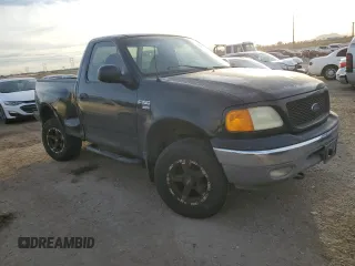 2004 Ford F-150 with VIN 2FTRF08W74CA53629, listed as a Copart auction lot 87326734 with 229,631 mi miles and Salvage title. Bid and sale history available at DreamBid. Image 4.