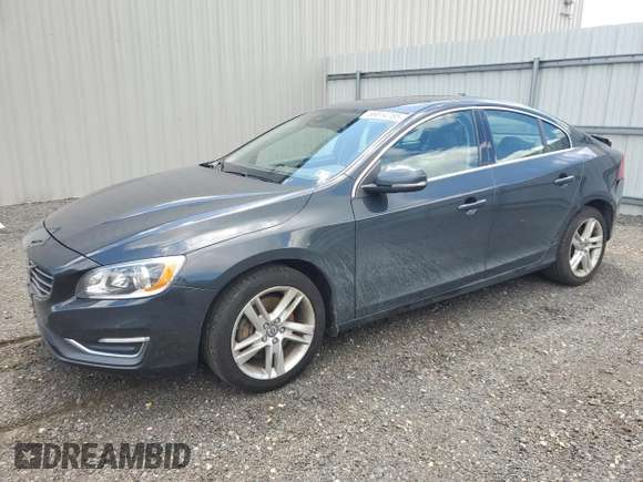 2014 Volvo S60 T5 z VIN YV1612FS6E1287285, wystawiony jako Copart lot #56614785 z przebiegiem 104 637 mil mil oraz Szkody całkowita. Historia ofert i sprzedaży dostępna na DreamBid. Obrazek 1.