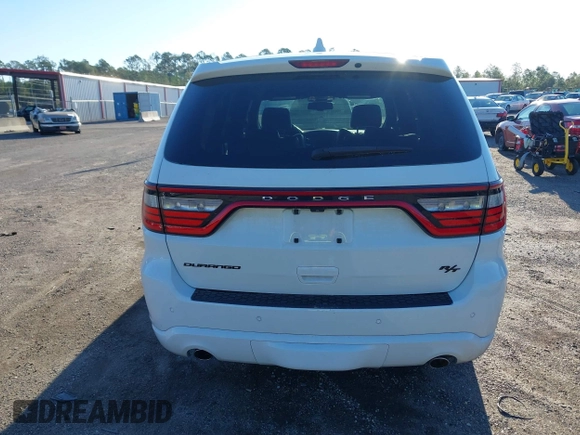 2015 Dodge Durango R/T with VIN 1C4SDHCT7FC873768, listed as a IAAI auction lot 41814710 with 130,237 mi miles and . Bid and sale history available at DreamBid. Image 16.