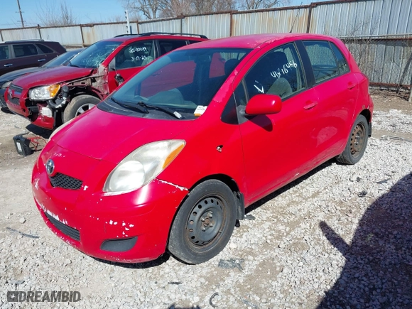 2010 Toyota Yaris with VIN JTDKT4K36A5295530, listed as a IAAI auction lot 41896456 with 337,570 mi miles. Bid and sale history available at carsss.com. Image 6.