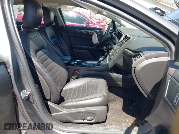 2014 Ford Fusion SE with VIN 3FA6P0H9XER319864, listed as a IAAI auction lot 42063072 with 151,526 mi miles. Bid and sale history available at carsss.com. Image 5.