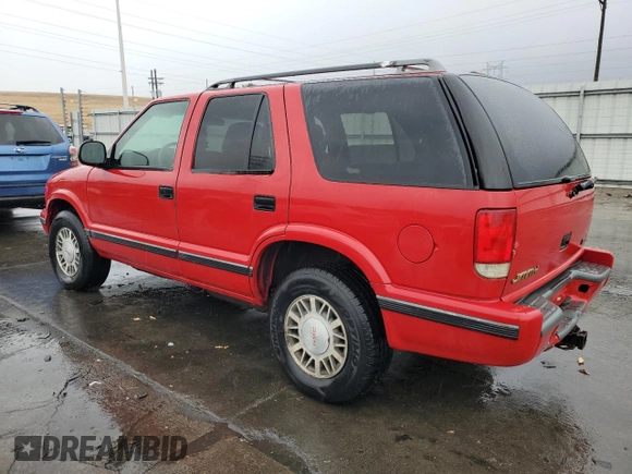 1998 GMC Jimmy SLE with VIN 1GKDT13W1W2508350, listed as a Copart auction lot 77904394 with 175,000 mi miles and Salvage Title. Bid and sale history available at carsss.com. Image 2.