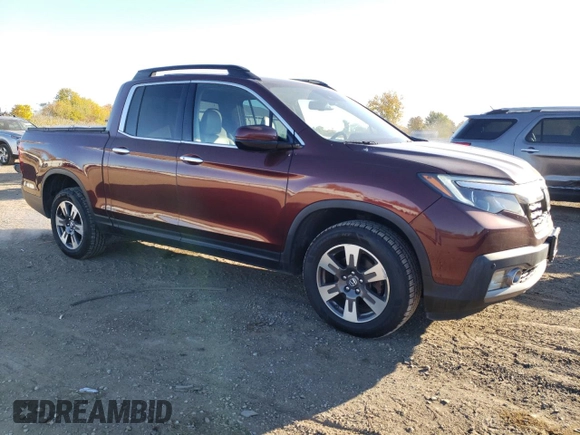 2017 Honda Ridgeline RTL-E with VIN 5FPYK3F78HB027423, listed as a Copart auction lot 77813284 with 199,041 mi miles and Clean title. Bid and sale history available at DreamBid. Image 4.