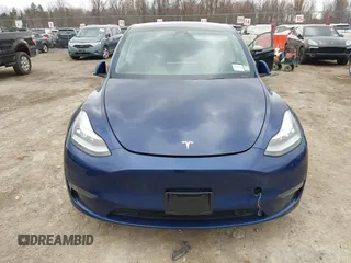 2020 Tesla Model Y Long Range with VIN 5YJYGDEF0LF000380, listed as a IAAI auction lot 41867489 with 66,294 mi miles and . Bid and sale history available at DreamBid. Image 12.