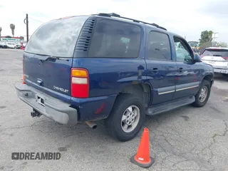 2003 Chevrolet Tahoe LS z VIN 1GNEC13T73R263893, wystawiony jako IAAI lot #41906772 z przebiegiem 211 759 mil mil oraz . Historia ofert i sprzedaży dostępna na DreamBid. Obrazek 4.