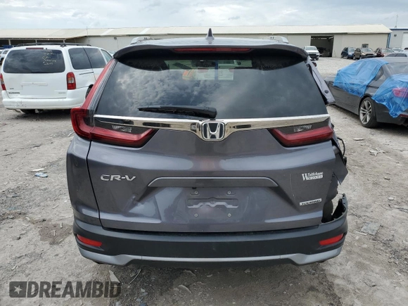 2020 Honda CR-V Touring z VIN 7FARW1H97LE009965, wystawiony jako Copart lot #55317275 z przebiegiem 47 369 mil mil oraz Szkoda całkowita • Salvage title. Historia ofert i sprzedaży dostępna na DreamBid. Obrazek 6.