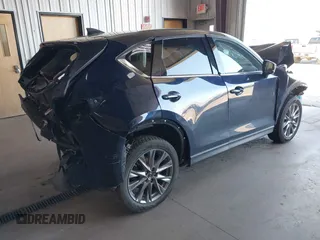 2020 Mazda CX-5 Grand Touring with VIN JM3KFBDM8L0781491, listed as a IAAI auction lot 39788385 with 57,316 mi miles and . Bid and sale history available at carsss.com. Image 4.