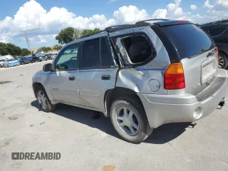 2004 GMC Envoy SLT с VIN 1GKDS13S542129977, выставлен на аукционе Copart как лот 61170465 с пробегом 129 897 миль миль и Списание • Salvage title. История ставок и продаж доступна на DreamBid. Изображение 2.