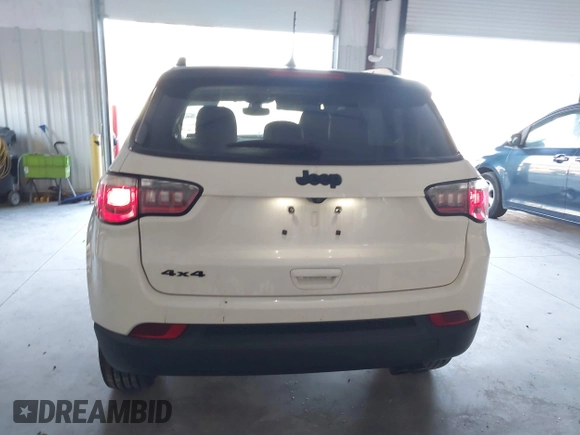 2018 Jeep Compass Altitude with VIN 3C4NJDBB4JT395992, listed as a IAAI auction lot 41318649 with 88,887 mi miles and . Bid and sale history available at carsss.com. Image 16.