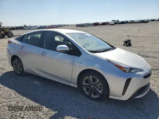 2021 Toyota Prius L Eco with VIN JTDKAMFU6M3138511, listed as a Copart auction lot 50776955 with 29,621 mi miles and Salvage Title. Bid and sale history available at carsss.com. Image 4.
