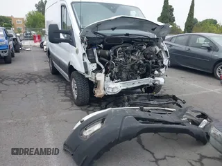 2023 Ford Transit Cargo with VIN 1FTBR1C86PKA02758, listed as a IAAI auction lot 42465866 with 33,095 mi miles and . Bid and sale history available at DreamBid. Image 18.