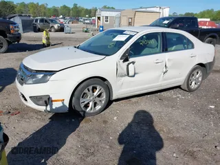 2012 Ford Fusion SE with VIN 3FAHP0HA9CR402640, listed as a IAAI auction lot 42052610 with 210,441 mi miles and . Bid and sale history available at carsss.com. Image 2.