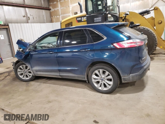 2020 Ford Edge Titanium with VIN 2FMPK4K95LBB52172, listed as a Copart auction lot 60884295 with 67,554 mi miles and Salvage title. Bid and sale history available at DreamBid. Image 2.
