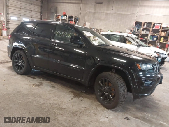 2018 Jeep Grand Cherokee Laredo E with VIN 1C4RJFAG4JC298393, listed as a IAAI auction lot 42073426 with 145,386 mi miles. Bid and sale history available at carsss.com. Image 1.