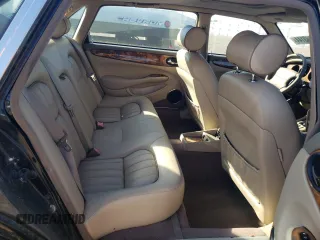 2001 Jaguar XJ with VIN SAJDA23C31LF28667, listed as a Copart auction lot 76983144 with 87,542 mi miles and Clean title. Bid and sale history available at DreamBid. Image 10.
