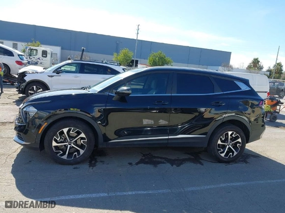 2023 Kia Sportage Hybrid EX with VIN KNDPVCAG5P7017620, listed as a IAAI auction lot 41709782 with 85,720 mi miles. Bid and sale history available at carsss.com. Image 14.