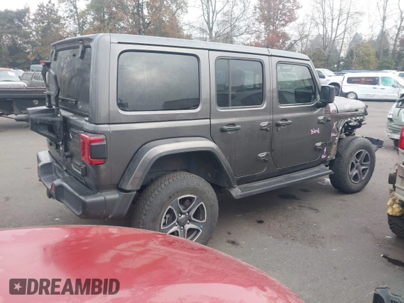 2021 Jeep Wrangler Unlimited Sahara z VIN 1C4JJXP68MW745098, wystawiony jako IAAI lot #41461092 z przebiegiem 36 410 mil mil oraz . Historia ofert i sprzedaży dostępna na DreamBid. Obrazek 4.