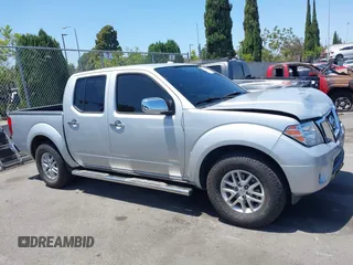 2015 Nissan Frontier SV with VIN 1N6AD0ER1FN726314, listed as a IAAI auction lot 42532117 with 61,991 mi miles and . Bid and sale history available at DreamBid. Image 13.