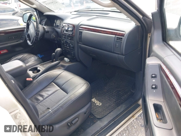 2002 Jeep Grand Cherokee Limited with VIN 1J8GW58J22C115460, listed as a IAAI auction lot 42291615 with 197,132 mi miles and . Bid and sale history available at DreamBid. Image 5.