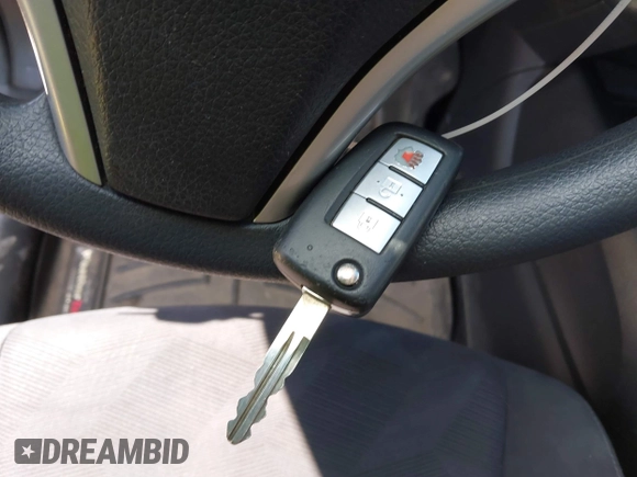 2015 Nissan Rogue S with VIN KNMAT2MVXFP527878, listed as a IAAI auction lot 41864389 with 87,305 mi miles and . Bid and sale history available at DreamBid. Image 11.