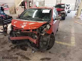 2012 Scion iQ with VIN JTNJJXB0XCJ019799, listed as a IAAI auction lot 41244212 with 1 mi miles. Bid and sale history available at carsss.com. Image 2.