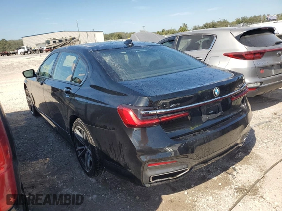 2020 BMW 7 Series 750i xDrive with VIN WBA7U2C0XLGM27270, listed as a Copart auction lot 77241404 with 68,998 mi miles and Salvage Title. Bid and sale history available at carsss.com. Image 2.